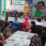 Pláticas sobre ecología y reforestación en "Mis Vacaciones en la Biblioteca", con pinos donados para fomentar el cuidado del medio ambiente